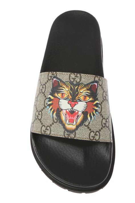 sneakers gucci tigre|Gucci tiger head slides.